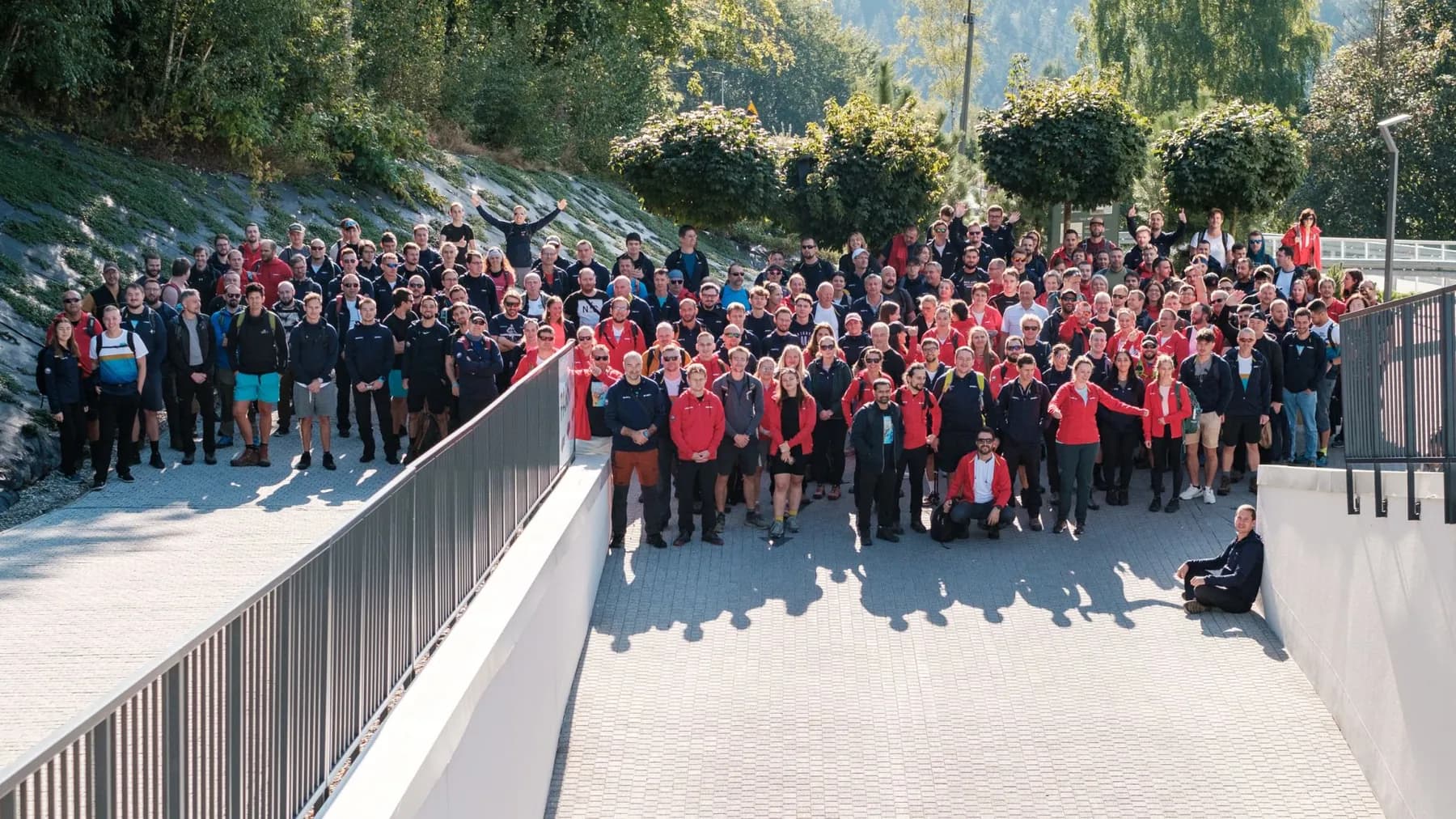 The MONET+ team gathered outdoors for a group photo